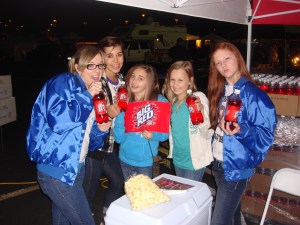 Working the Big Red booth at the BBQ cook-off