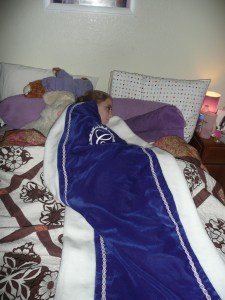 Robyn sleeping under her robe the night she was crowned